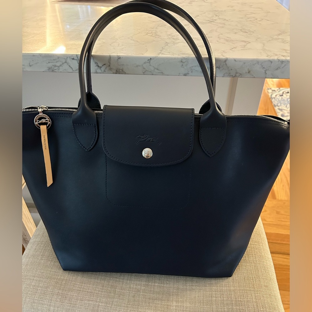 LONGCHAMP LE PLIAGE CITY
Tote Bag in Blue Coated Canvas.